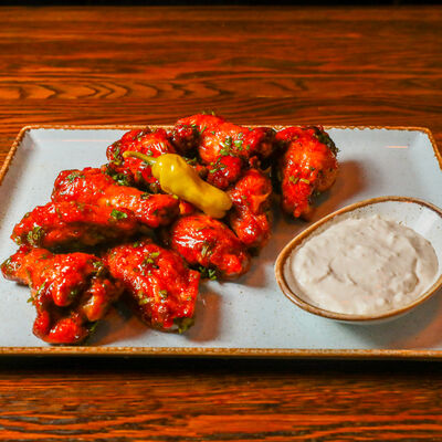 Куриные крылья по-тайски в Таверна Фили Хаус по цене 780 ₽