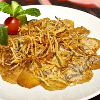 Мясо по-бухарскив Чайхана Кишлак по цене 699 ₽