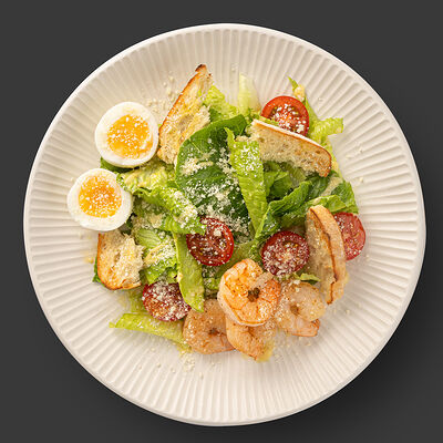 Цезарь с тигровыми креветками в Secret Kitchen по цене 790 ₽