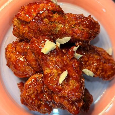 Жареные крылышки Яннëм в Мистер пак по цене 494 ₽