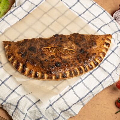 Кальцоне по-грузински с мясом в Пицца да Спагетти по цене 735 ₽