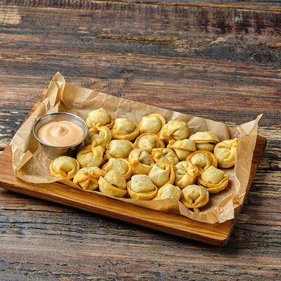 Жареные пельмени с соусом Бургер в BARak O’Mama по цене 450 ₽