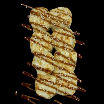 Запеченный ролл Тортилья в Kaikan по цене 555 ₽