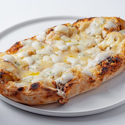 Пицца Римская Четыре сыра в Romano по цене 1600 ₽