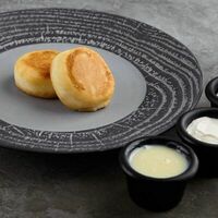 Сырники с топпингом на выбор (сметана, сгущенка, джем) в Buffet