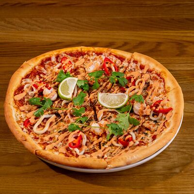 Пицца Морепродукты в Хосперкафе бульвар по цене 1280 ₽