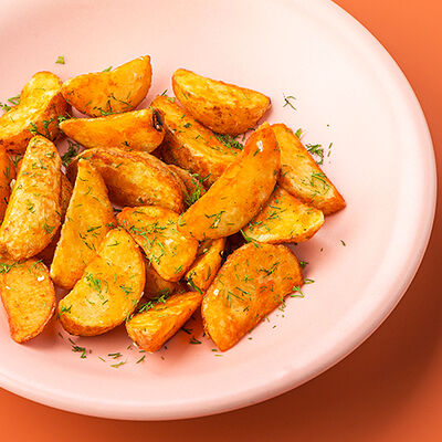 Картофельные дольки с золотистой корочкой в Сушилка по цене 290 ₽