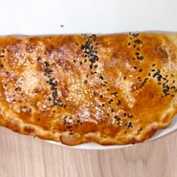 Кальцоне с курочкой и помидорами в Лиса Пицца