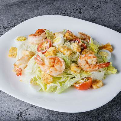 Салат Цезарь с креветками в THE BOX по цене 570
