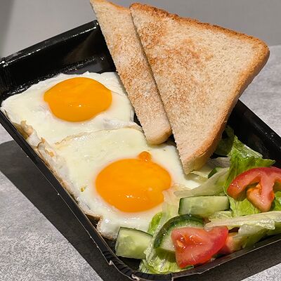 Яичница с тостом в Фабрика чизкейков по цене 180 ₽