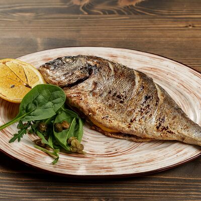 Дорадо с лимоном грильв Гастробар Феллини по цене 1400 ₽