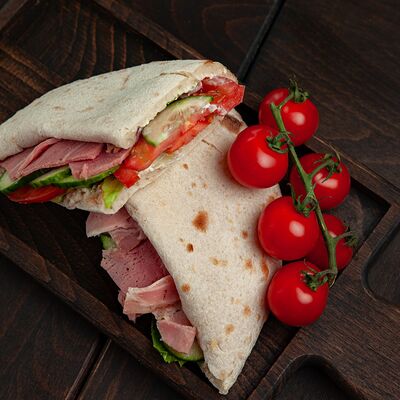 Панини с фермерской ветчиной в Storia Pizza по цене 515 ₽