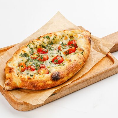 Хачапури с копченым сулугуни, томатами и кинзой в Бублик по цене 420 ₽