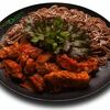 Томленая индейка с лапшой гречневой в FoodDish по цене 390