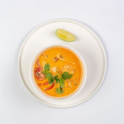 Суп Том ям с королевской креветкой и командорским кальмаромв Итальянская Пиццерия по цене 659 ₽