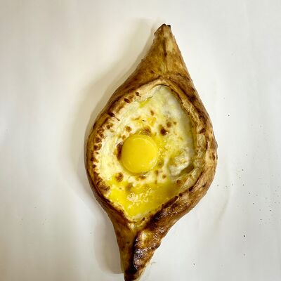 Хачапури по-аджарски в Печь Мангал по цене 550 ₽