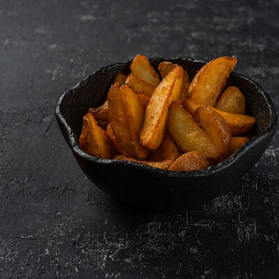 Картофель по-деревенски в Kitana по цене 288 ₽