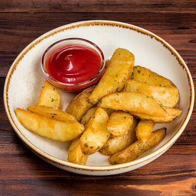 Ремесленный картофельв Трактир Колесо по цене 280 ₽