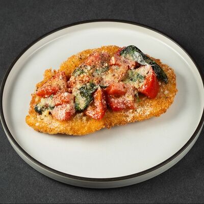 Миланский куриный шницель с теплыми томатами в Cherish по цене 690 ₽