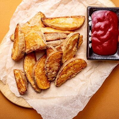 Картофель по-деревенски в Eedaa по цене 130 ₽