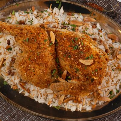Курица в духовке и рис в Кафе Аль-карамарабская кухня по цене 850 ₽