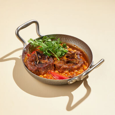 Томленая шея барашка с нутом и овощами в Plov Project по цене 750 ₽