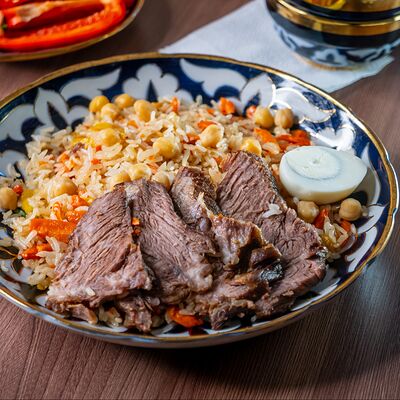 Плов с говядиной в Узбекская кухня по цене 400 ₽