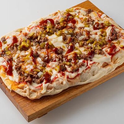 Пицца мясная в Роллпепперони по цене 690 ₽