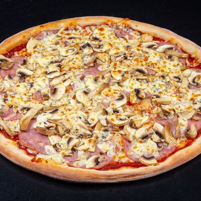 Пицца Ветчина с Грибами в Булка и Мясо по цене 920 ₽
