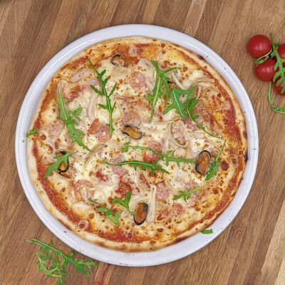 Пицца с морепродуктами в 30 см по цене 1300 ₽