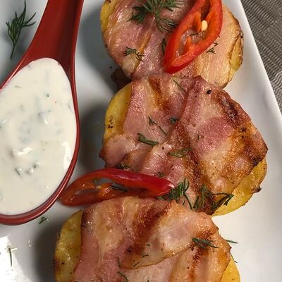 Картофель в беконе в Первая реберная Кухня по цене 300 ₽