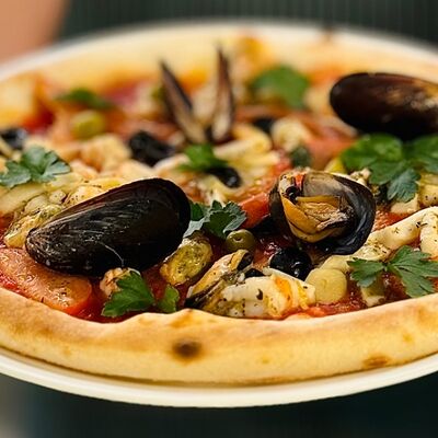 Пицца с морепродуктами в Al Dente по цене 39 р.