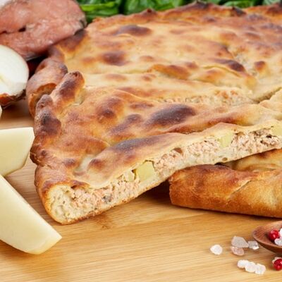 Пирог с фаршем и картофелем в Осетинские пироги 22 по цене 650 ₽