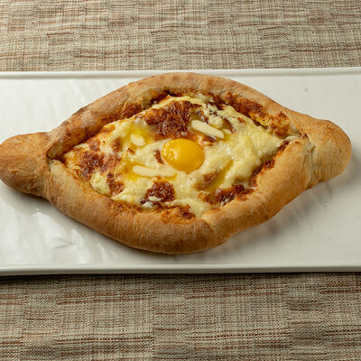 Хачапури по-аджарски с яйцом в Самовар по цене 550 ₽