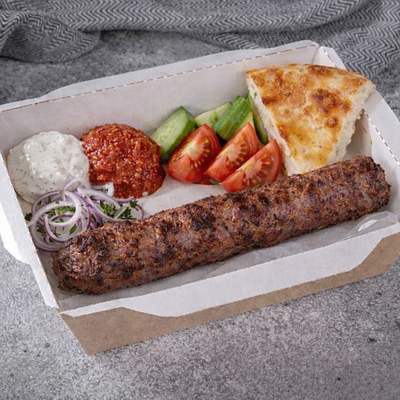 Люля говядина на тарелке в КОМБИНАТ шаурма и стритфуд по цене 388 ₽