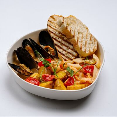 Соте из морепродуктов в соусе том ямв Каспий по цене 979 ₽