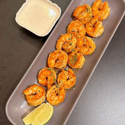 Дюжина креветок Том ям с чесночным соусом в Лепила мама по цене 1170 ₽