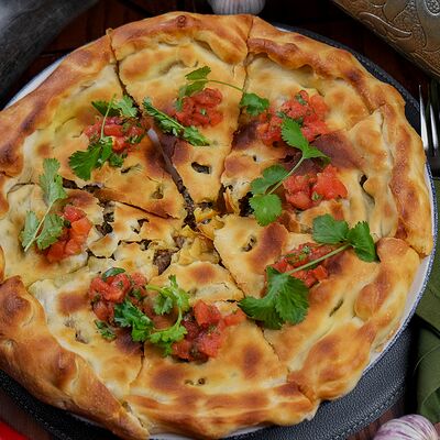 Осетинский пирог с мясом в Утомленные солнцем по цене 950 ₽