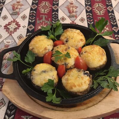 Шампиньоны запеченные под сыром в Resto bar Варшава по цене 420 ₽