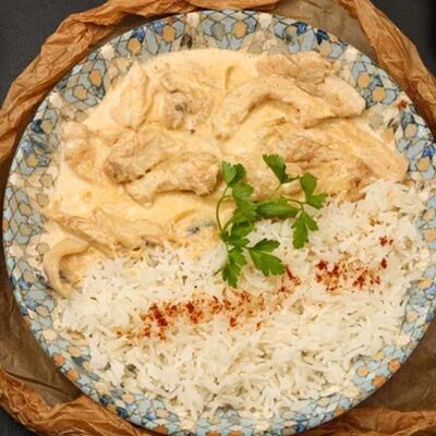 Курица с грибами в сливочном соусев Тарелка по цене 375 ₽