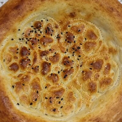 Большая узбекская лепешка в Сэр Донер по цене 200 ₽