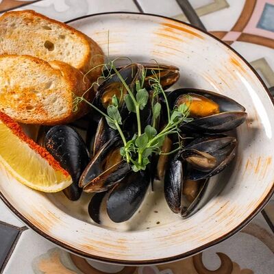 Мидии в сливочном соусе в Каретный дворик по цене 850 ₽