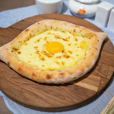 Хачапури по-аджарски в Гриль house по цене 380 ₽