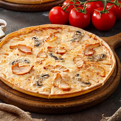 Пицца Куриная три сыра в Dada по цене 480 ₽