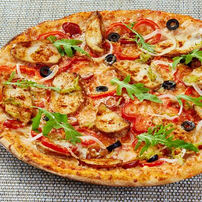 Пицца Острая с курицей и перцем халапеньо в Pizza-house по цене 670 ₽