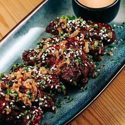 Куриные крылья барбекю в Наше место по цене 600 ₽