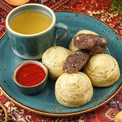 Хинкал Даргинский с сушеной колбасой в Юрта Дагестанская кухня по цене 920 ₽