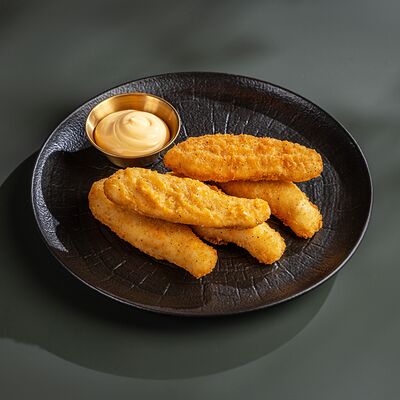 Куриные стрипсы с сырным соусомв Green Pub по цене 633 ₽