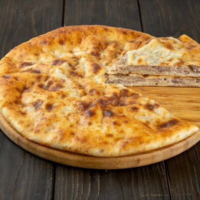Фирменный пирог Курица-говядина в Осетинские пироги Вкусно Пироги по цене 1100