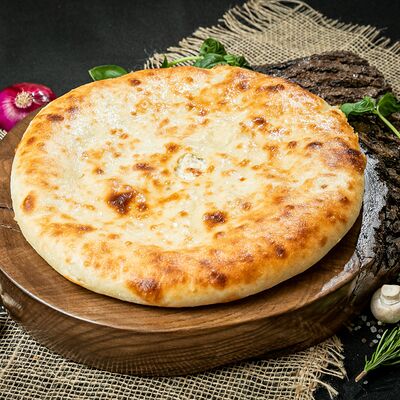 Осетинский пирог с курицей и грибами 28 см в Пицца Пала по цене 650 ₽